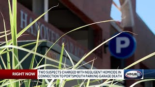 2 charged in man's fatal fall from parking garage