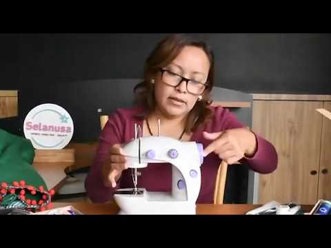 Mini máquina de coser eléctrica portátil que hace a mano la reparación