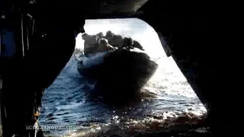 Chinook CH-47 Helicopter Picks up US Navy Seals Team Assault Boat Water Extraction on Rear Door Ramp