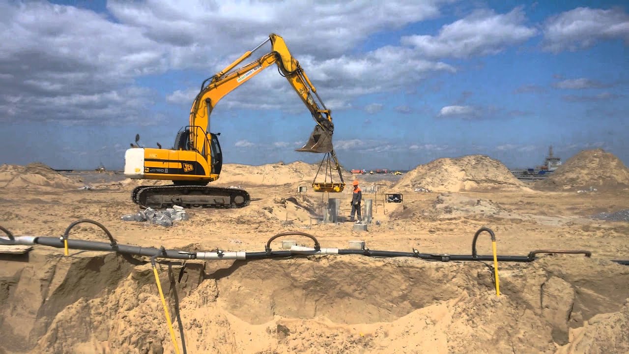 гидравлическая срубка свай. срезка оголовков свай технология. срубка оголовков свай bobcat 334. срубка оголовков свай отбойным молотком. сбивка оголовков свай.