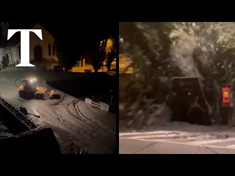 Moment river in Italy burst banks, causing mudslide