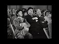 Laurel and hardy brings a dog into meeting disturbance everywhere air raid wardens scene from 1943