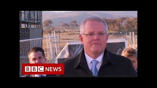Australian man interrupts PM Morrison to say 'get off my lawn'  - BBC News