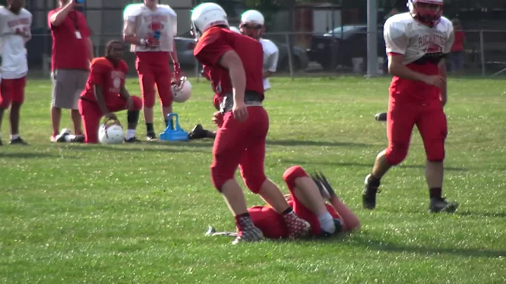 RICHMOND RB WYATT BYRD LAYS OUT TEAMMATE