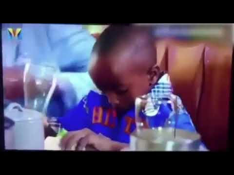 black-kid-spilled-orange-juice-during-dinner