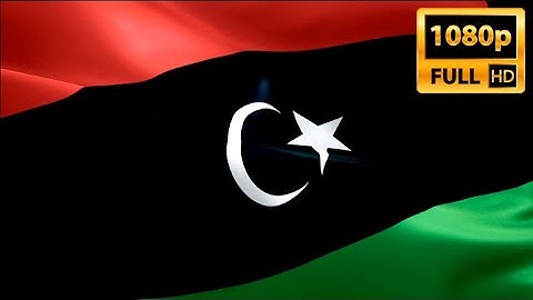 Libyan flag video waving in wind. Realistic Tripoli Flag background. Libya flag Full HD