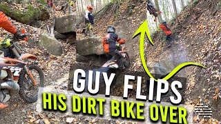 Guy Attempts to Go up Hill, Rocky Ledge, but Winds up Flipping His Dirt Bike Instead