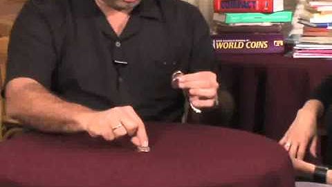 Expanded Shell New One Dollar  by Tango Magic at Penguin Magic