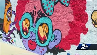 Muralist creates art in real time at OKC s annual Juneteenth celebration