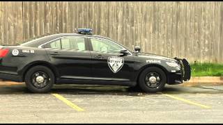Saginaw residents protest possible merger of police