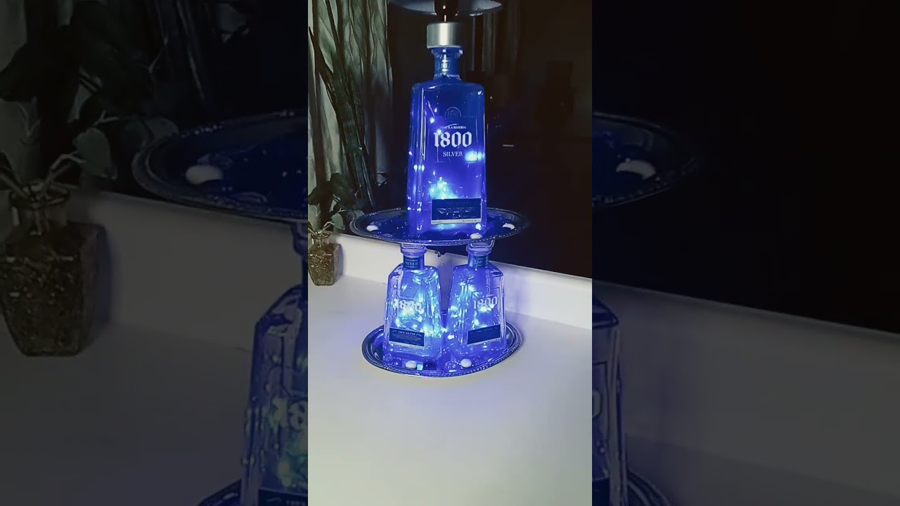 Awesome one of a kind bar decor lamp from recycled 1800 tequila bottles