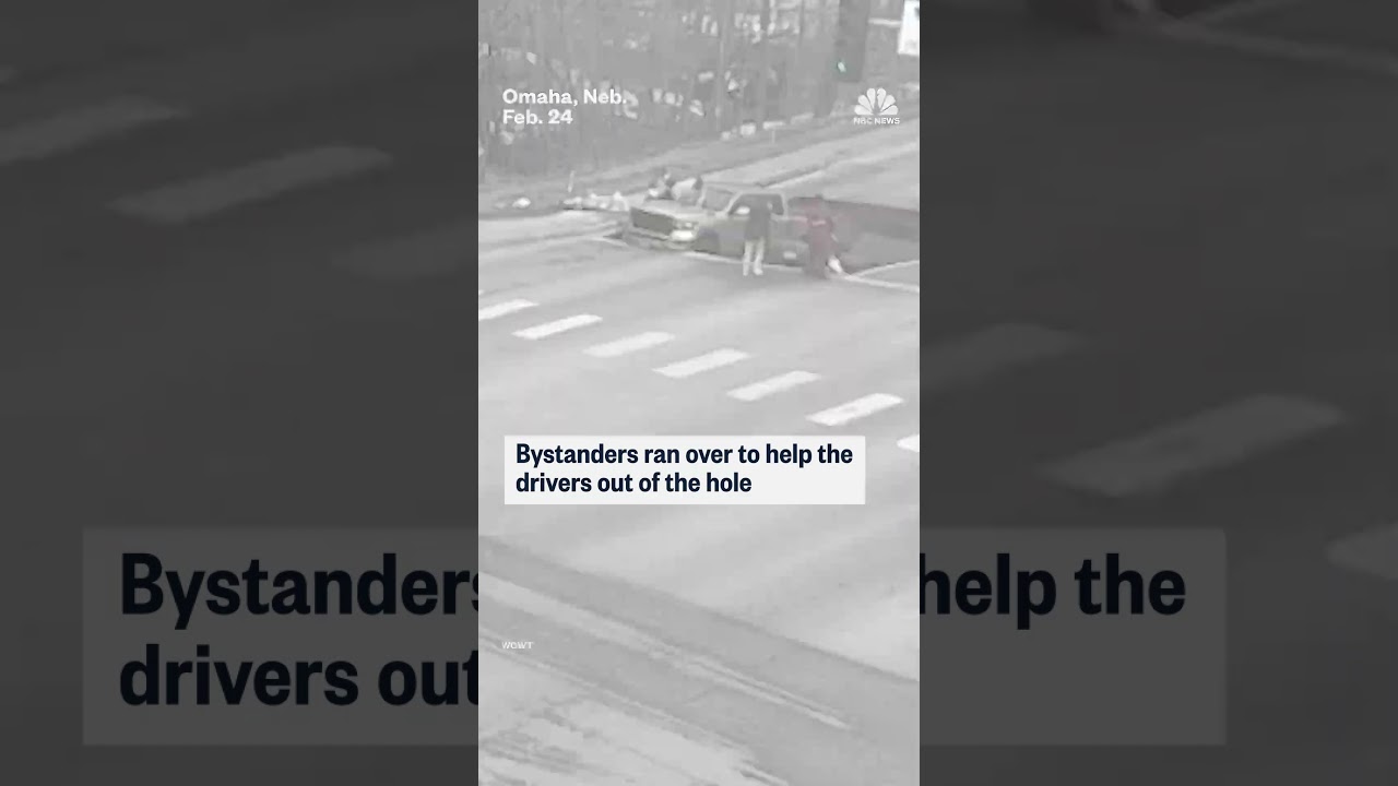 Sinkhole swallows up cars at Nebraska intersection