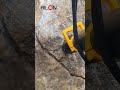Demonstrating the splitting performance of the RILON handheld rock splitter in South America.