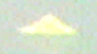 Shining triangular UFO filmed 22 years ago on video camera. Russia.