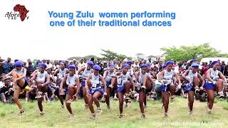 Young Zulu women performing one of their traditional dances