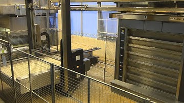 Kornfeil deck oven bread production line with loading machine Asistent Line.