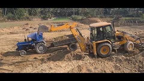 Jcb 3dx Backhoe Machine loading soil in swaraj Tractors