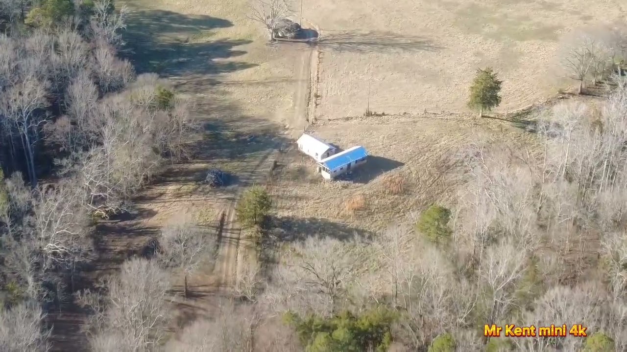 DJI Mr Kent mini 4k explores open fields 