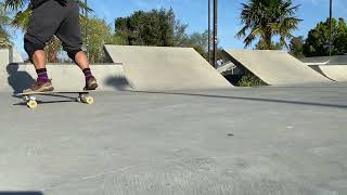 Cross step on a surfskate