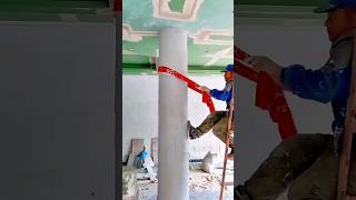 Smoothing and Finishing a Large Concrete Pillar Using a Long Flexible Hand Tool #shorts