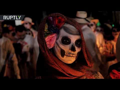 Day of the dead: Thousands gather in Mexico to celebrate annual holiday