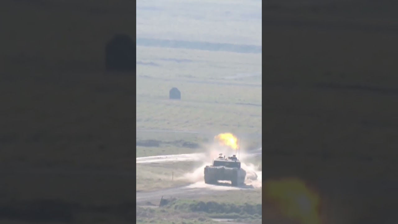 Challenger 2 tank firing....Boom.. Nikon P600