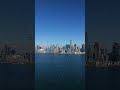 Toronto's waterfront skyline with CN Tower, famous Canadian city landmark and calm water of Lake