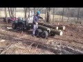 ATV Loading timber with remote-controlled hydraulic winch