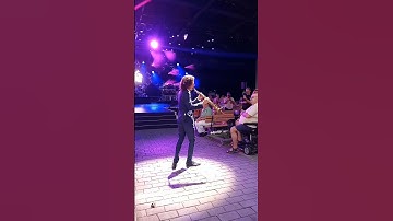 Thumbnail of Kenny G plays in the aisles at Epcot!! Amazing he was so close to audience! Magical!