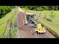 Heavy Equipment Road Grader and Dump Truck with Drone