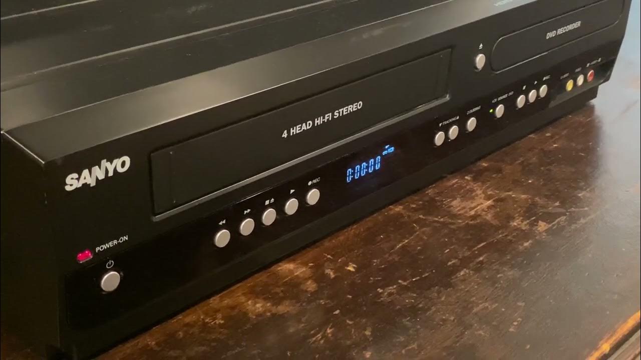 putting VHS tape in - YouTube
