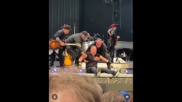 Bruce Springsteen falls on stage while performing in Amsterdam
