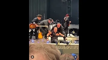 Bruce Springsteen falls on stage while performing in Amsterdam