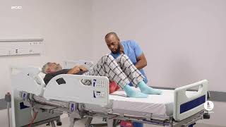 Removing Slide sheets under patients | Patient Handling​ | Arjo Global