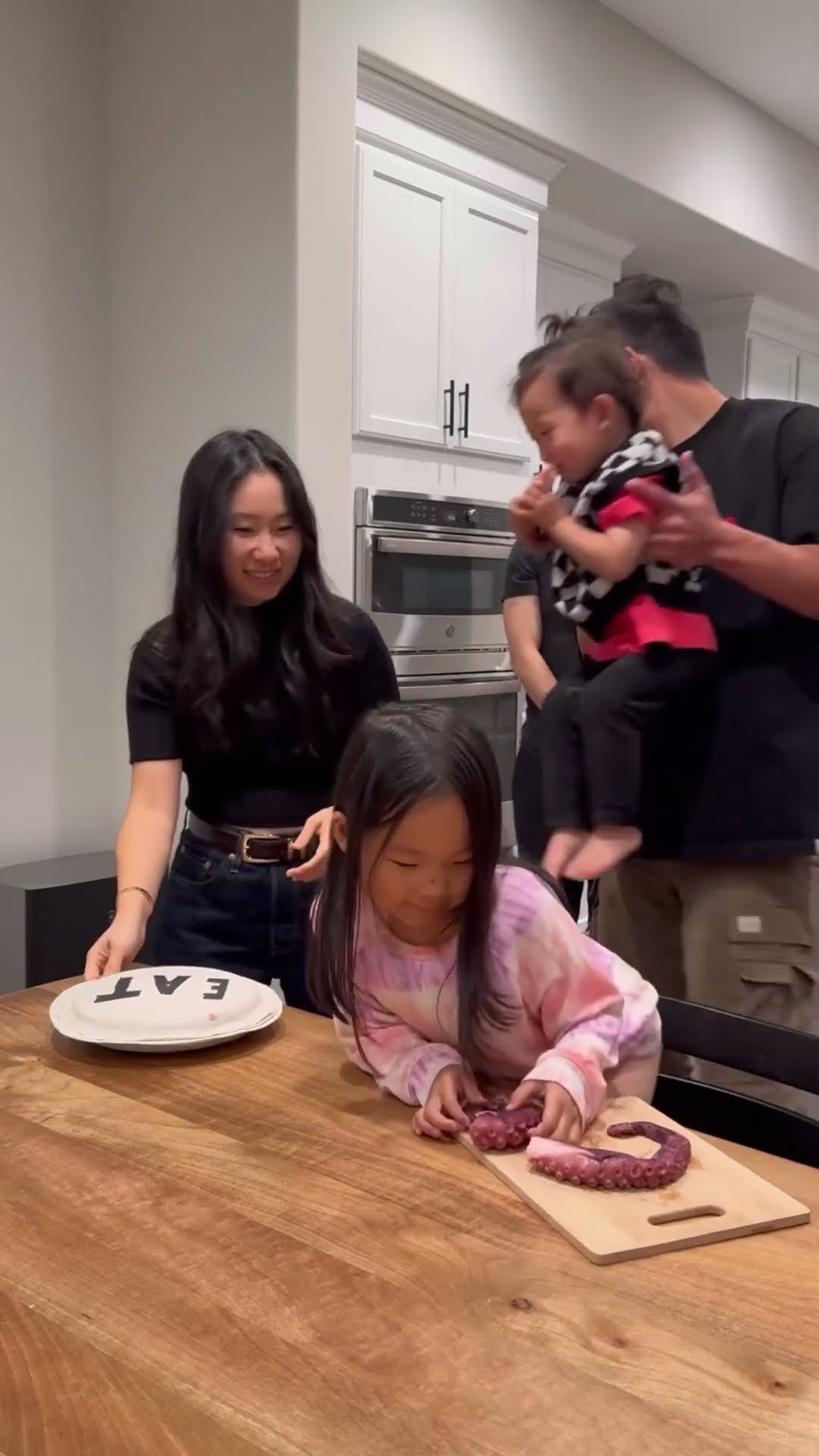 Hungry Baby doesn’t want to share the octopus leg ??