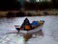 British Seagull pushing a Mirror Dinghy on Tiverton Canal