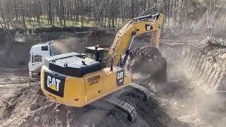 Caterpillar 352F Excavator Loading Trucks