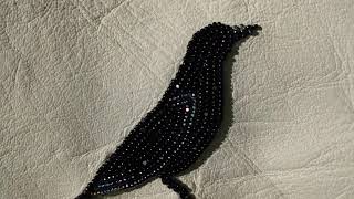 beaded crow