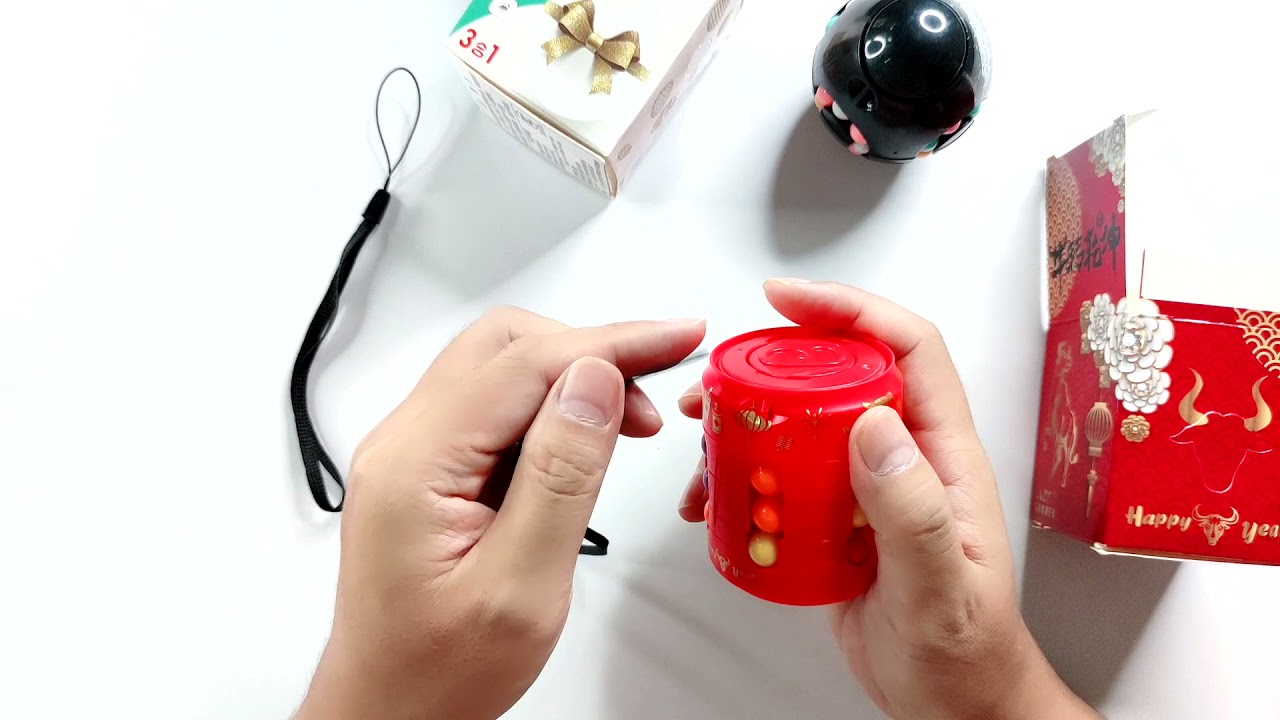 3 Magic Bean Cube Puzzle with 2 cans and 1 egg. Rotating Dimple Fidget Spinner.  