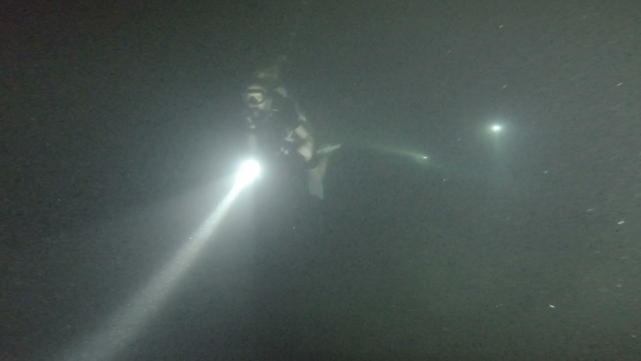 diving in El Salvador at night in lake ilopango