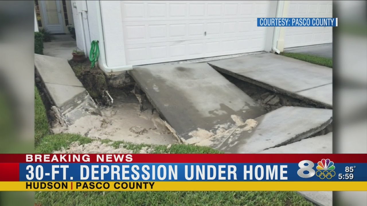 Depression near Pasco home confirmed sinkhole