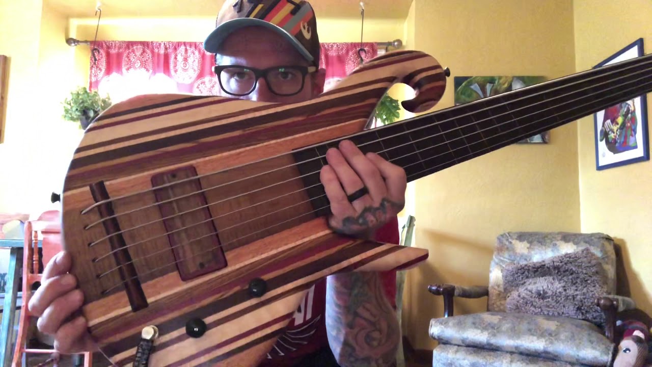 Beardly Customs fretless rainbow 6 string bass - YouTube
