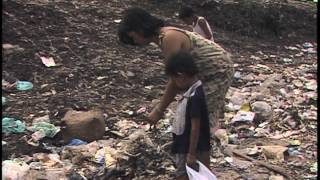 Smokey Mountain in Manila- sorting trash for metals & plastics to sell