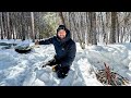 Winter camping in dangerous temperatures  snow trench