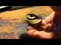 Brass spin toy by Paweł Pilnik Pilecki