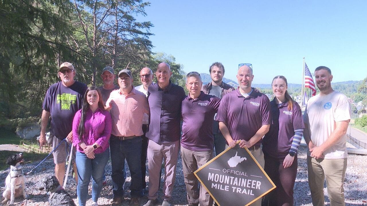 Pleasants County officials accept the Mountaineer Mile Challenge