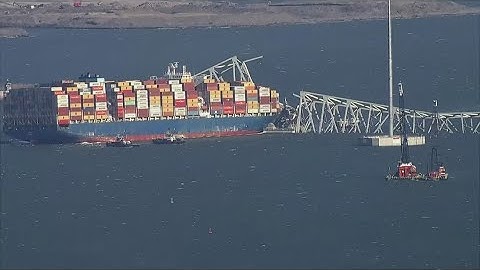 Crews work to remove parts of collapsed Baltimore bridge wreckage