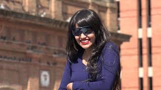 Laughing Woman Wearing Sunglasses And Wig