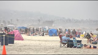 Visitors fill San Diego beaches as heat wave hits the Pacific Southwest