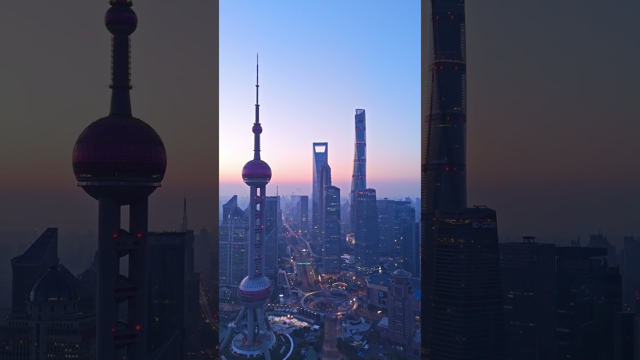 Oriental Pearl Tower on the left, with the Shanghai Tower and Jin
